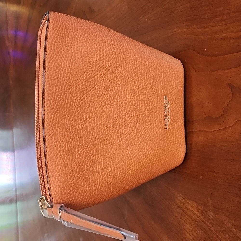 Laura Mercier tan brown bag